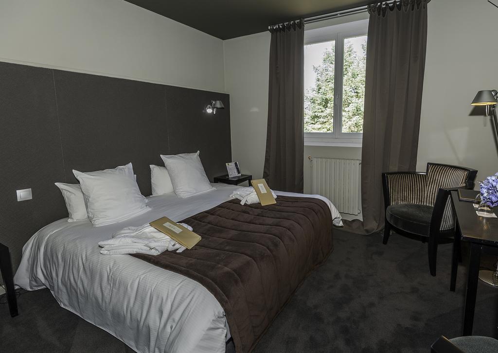 סנט-ג'וניין Logis Hotel - Restaurant Le Relais De Comodoliac מראה חיצוני תמונה